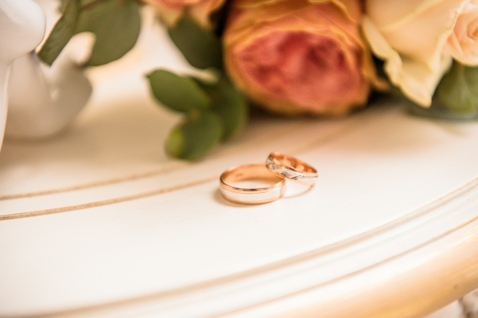two couple rings on table